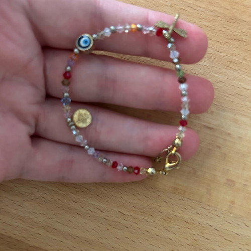 Thin bracelet with colorful stones and charms like new