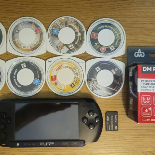 Sony PSP Street E1004 console with 8 top games and new charger
