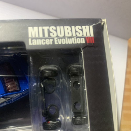 Diecast Mitsubishi Evo VII 1/64 new