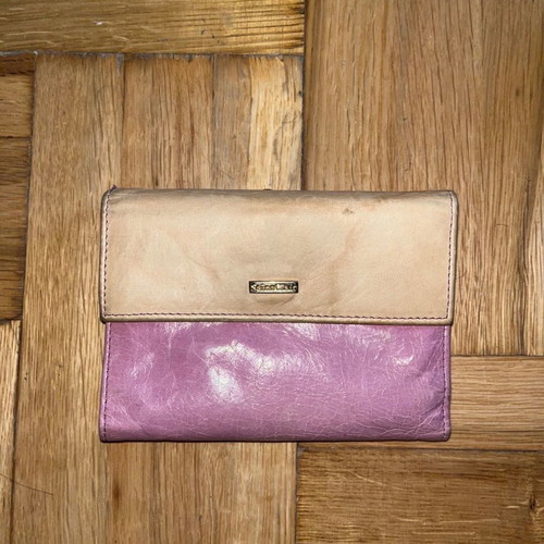 SaintClair leather wallet with wear on the back