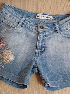 Women's denim shorts with embroidery like new condition