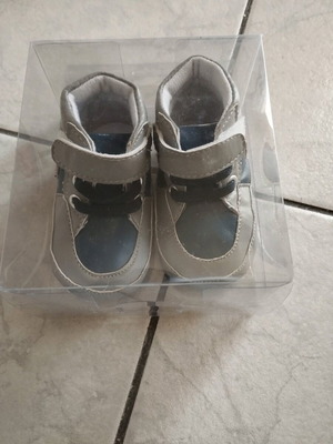 Baby shoes unused, cuddle style