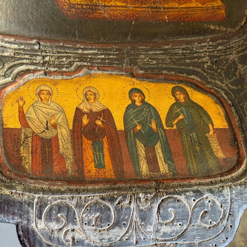 Handmade wooden trough with Orthodox icon used