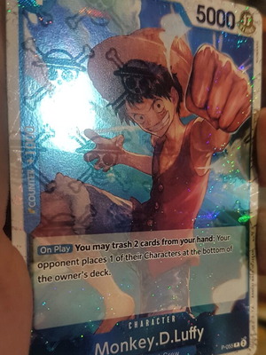 Monkey D Luffy One Piece TCG Promo card with Jolly Roger foil like new