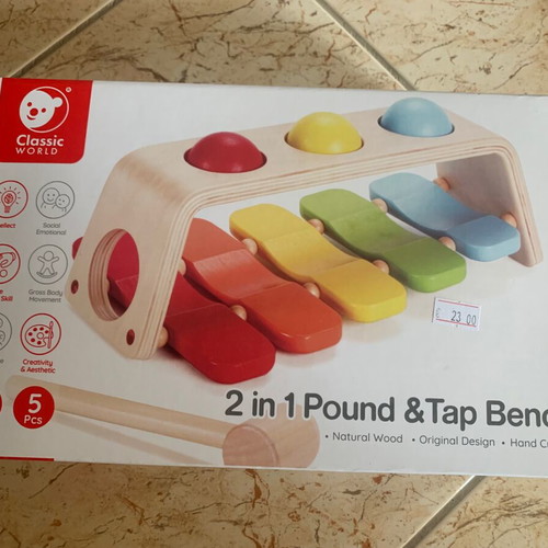 Baby toy like new, one ball with color damage