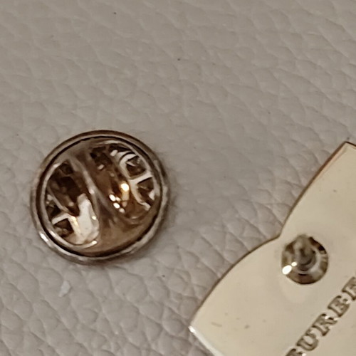Burberry enamel comedy and tragedy pin like new, gold tone