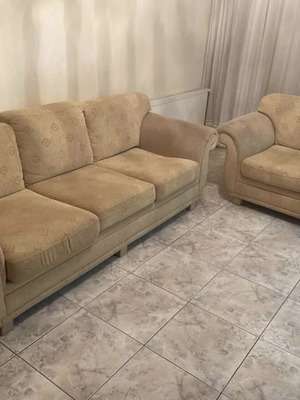 Living room sofa set used, includes three-seater and two-seater