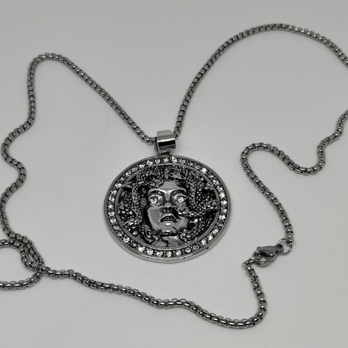 Medusa Pendant in Steel like new with rhinestones and chain
