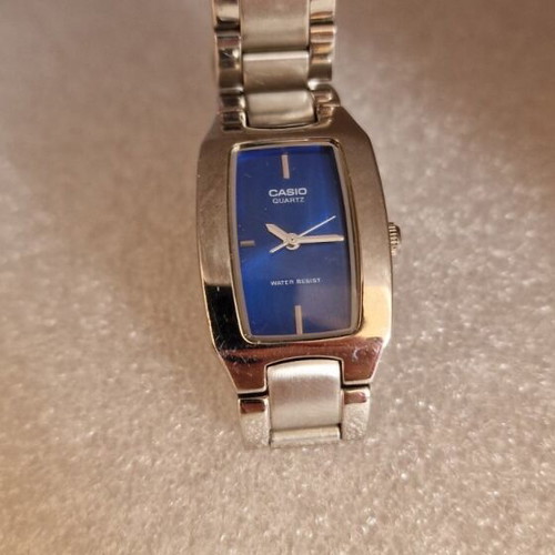 Casio Quartz wristwatch women's used with blue dial and silver bracelet
