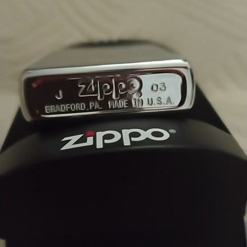 Zippo Assos International lighter like new, made in USA, brushed chrome