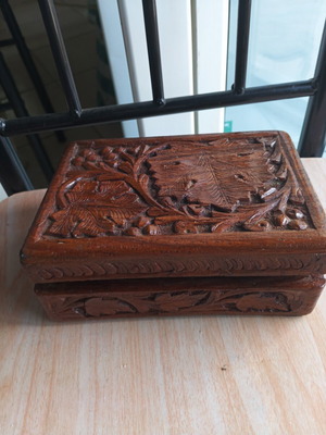 Vintage wooden jewelry box with carved design and blue lining, like new