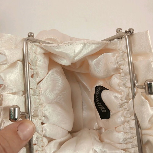 Skondras evening bridal bag used with roses and silver chain
