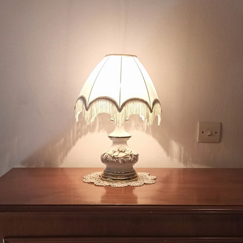 Vintage porcelain table lamp with fabric white shade and fringes used