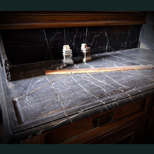 Antique solid wood cabinet with black marble top, used