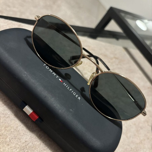 Tommy Hilfiger sunglasses with gold frame and dark lenses