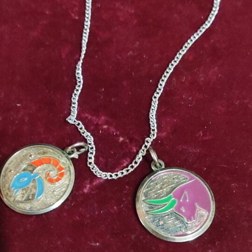 Zodiac Aries and Taurus enamel necklace set like new