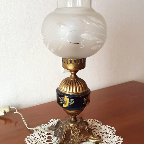 Vintage table lamp with glass shade and decorative metal base used