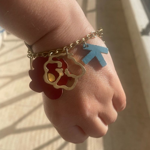 Kenzo necklace and bracelet set like new with unique charms