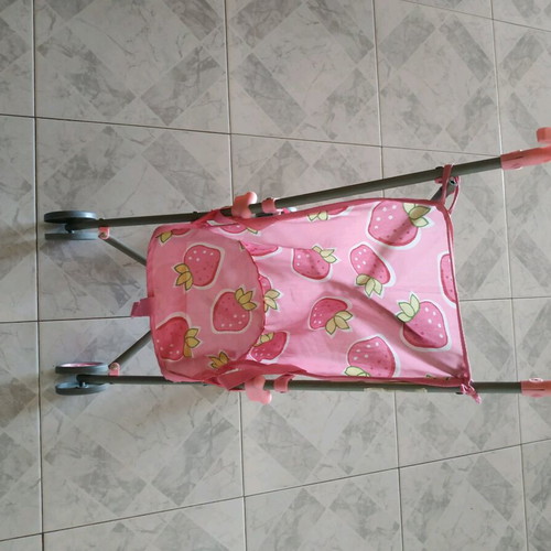 Doll stroller like new with 4 wheels