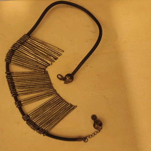 Necklace used with metal and cord