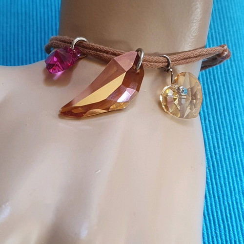 Adjustable bracelet used with brown and multicolor crystals