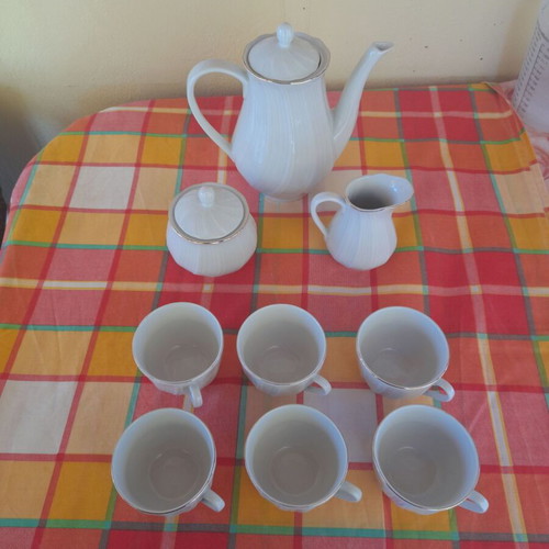 Porcelain tea set 9 pieces used, classic elegant design