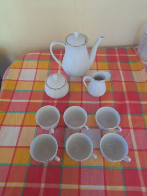 Porcelain tea set 9 pieces used, classic elegant design