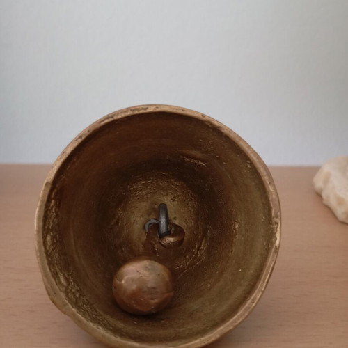 Vintage brass bell with embossed geometric designs like new