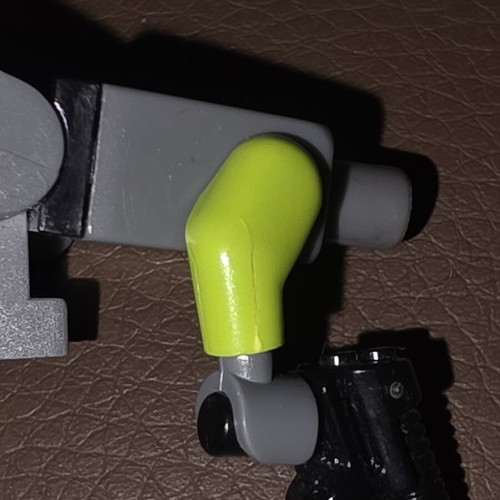 LEGO CMF Series 9 Alien Avenger minifigure with cracks on arms