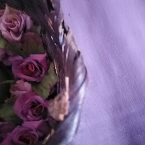 Decorative basket used with candle and floral wreath