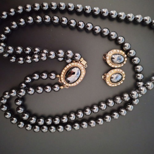 Vintage jewelry set used with black glossy beads and zircon