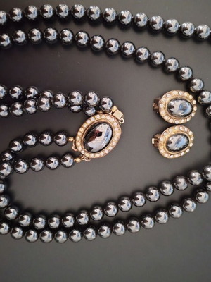 Vintage jewelry set used with black glossy beads and zircon