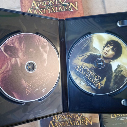The Lord of the Rings trilogy DVD set used with 2 bonus DVDs