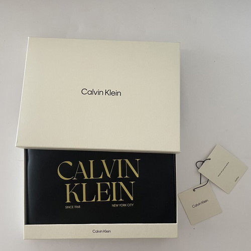 Calvin Klein graphic wristlet pouch, black and yellow