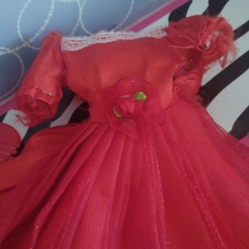 Barbie Colour Reveal doll with red dress