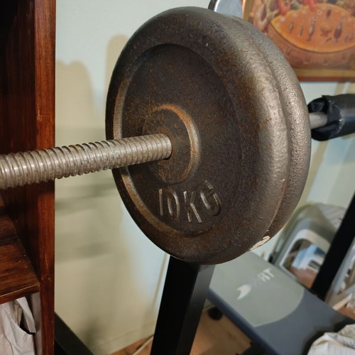 Weight bench with bar and weights used, iron