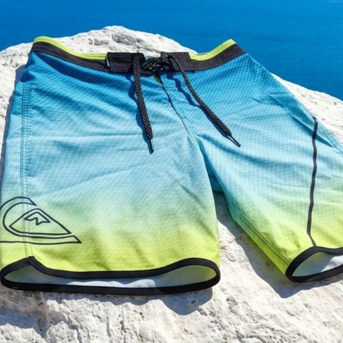 Quiksilver Bermuda shorts like new, turquoise, size 12-14 years