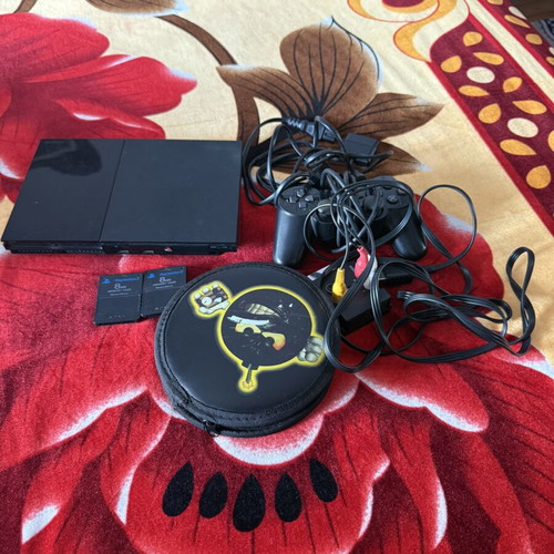 PlayStation 2 modified console used with original Sony controller and memory cards