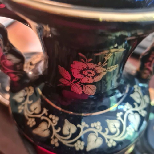 Vase and two ashtrays used, black porcelain with real gold, handmade