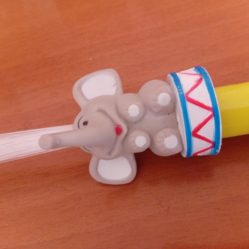 Vintage children's fiber optic wand with elephant figure from Medrano circus