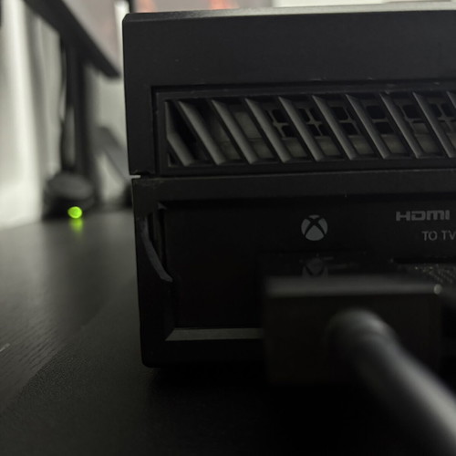 Xbox One 1TB console used with controller and 2 games