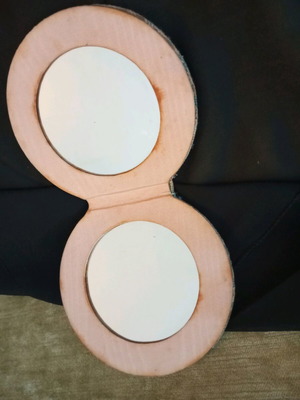 Double mirror used with tapestry