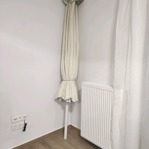 Outdoor umbrella like new, white without base