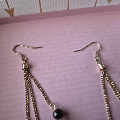 Boho feather dangle earrings like new, black and white