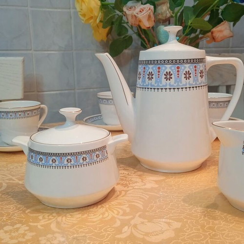 Chinese porcelain tea set like new with gold accents