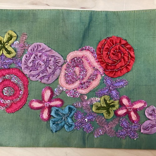 Evening bag satin texture with embossed embroidery like new, multicolor green