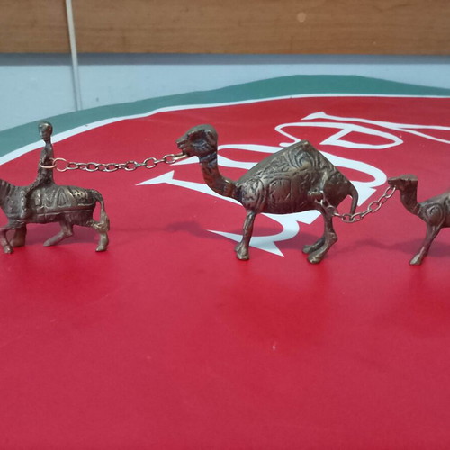 Antique brass paperweight caravan with camels and Bedouins like new