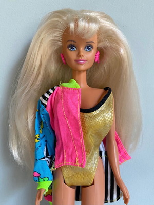 Vintage 1992 Hasbro Holiday Sindy doll used with original swimwear and neon jacket