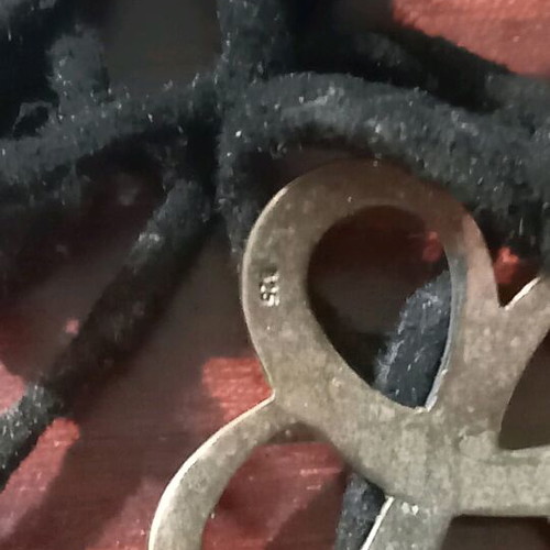 Silver necklace used with black cord, choker or bracelet style