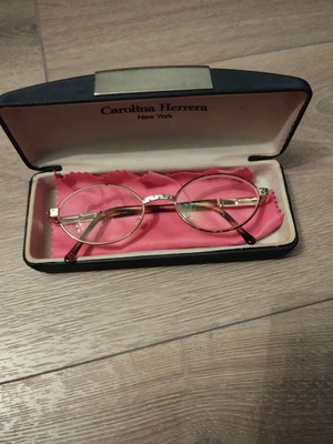 Carolina Herrera eyeglasses with gold frame like new